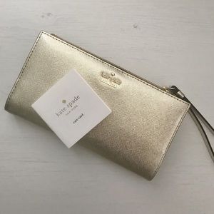 Gold Kate Spade Wristlet